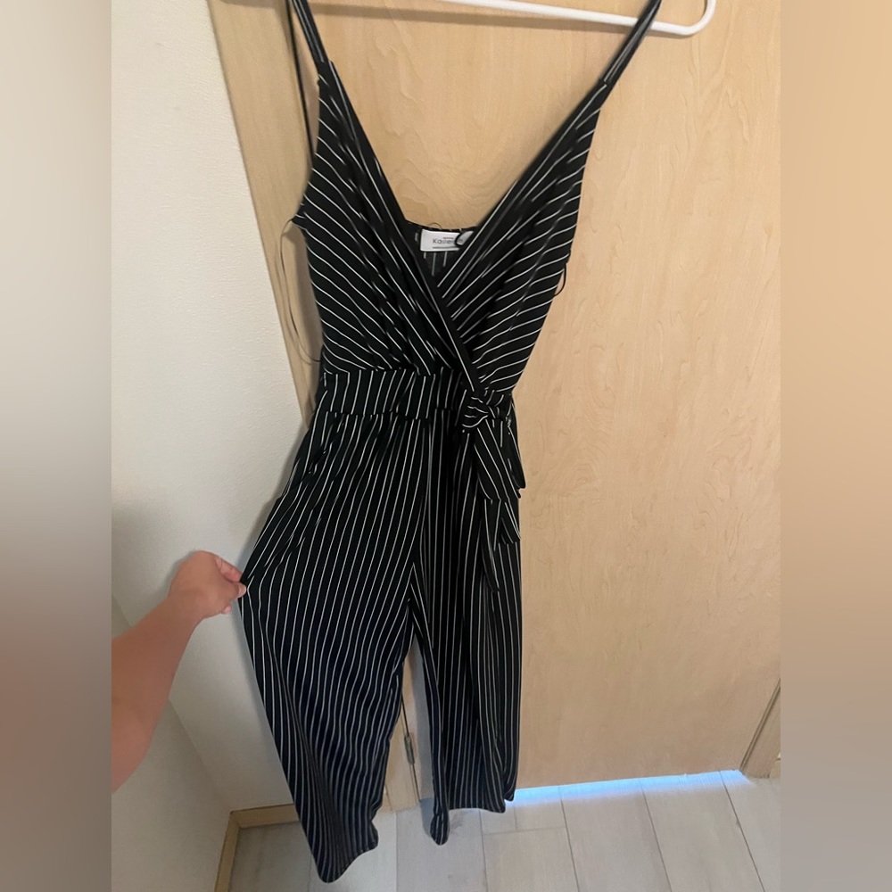 Kaileigh Rochelle knit jumpsuit. Black with white pinstripes. Size XS.